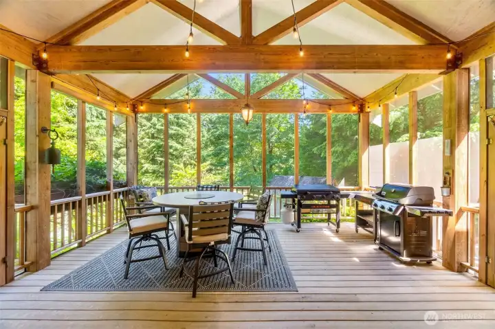 The covered and screened in deck is perfect for year round enjoyment!