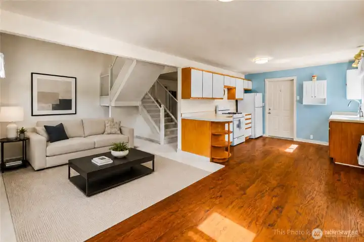 Virtually staged. Kitchen and living room area of the ADU
