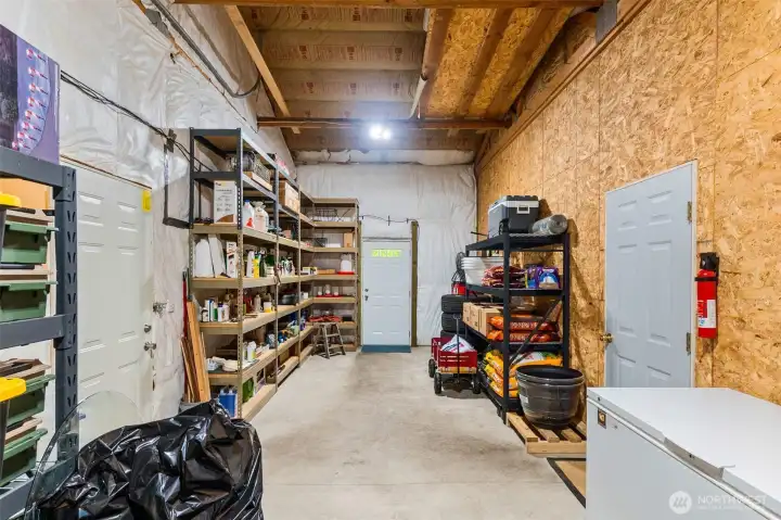 Storage space between ADU and the shop.
