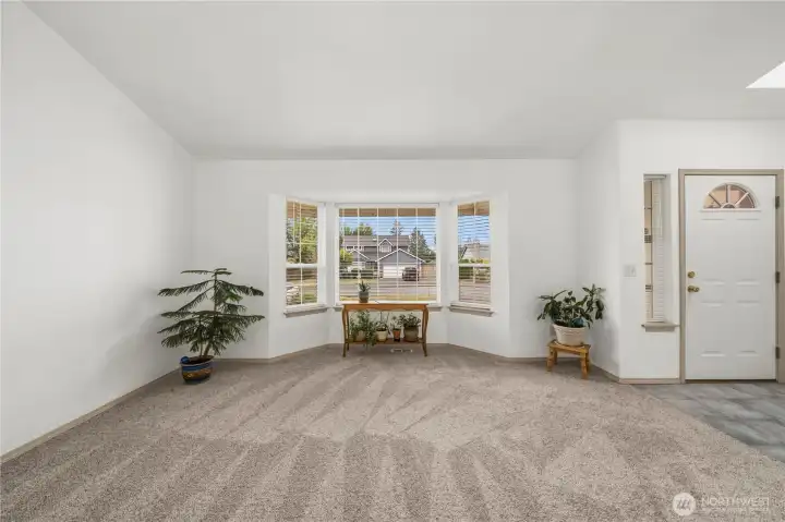Front family room is perfect for formal gatherings or casual hangouts. Front family room is perfect for formal gatherings or casual hangouts.