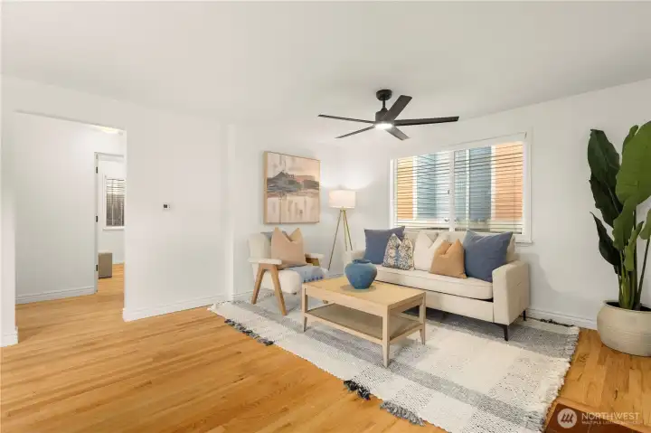 Cozy living area with oak hardwood floors thorough out
