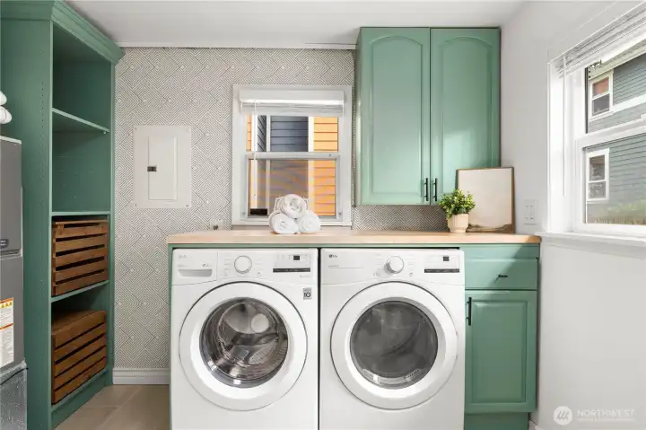 Full size washer & dryer in large pantry/utility area!