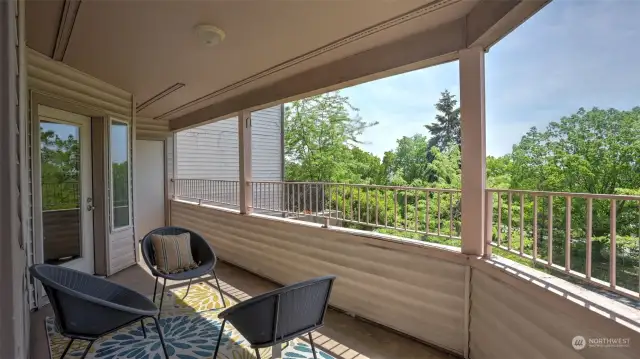 Enjoy this extended balcony with storage closet!