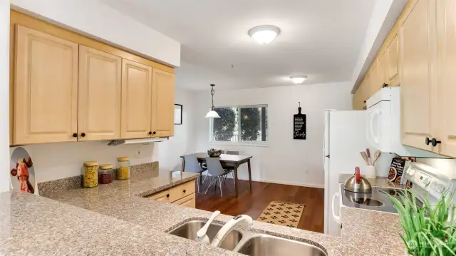 The kitchen is so spacious and provides dining space with views to the front.