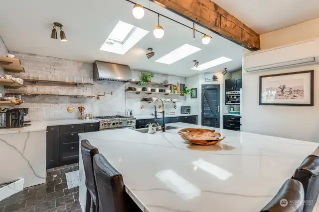 Chef's Kitchen with White Washed Brick, Live Edge Open Shelving