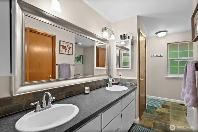 Primary with double sinks, bathtub and walk-in shower