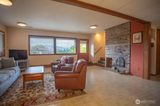 basement with fireplace and second bedroom
