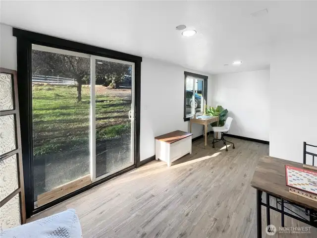 Light-filled bonus space with private entrance—perfect as an office, studio, or optional bedroom.