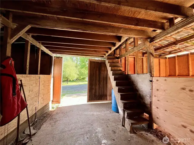 Functional access to loft space ideal for hay, tack, or seasonal supplies.