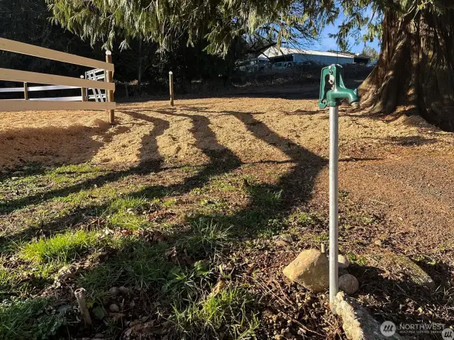 Well-placed spigot next to corral makes daily chores quick and efficient.