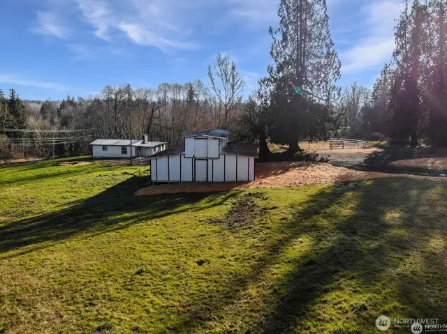 The complete picture—barn and home beautifully positioned for a practical and peaceful lifestyle.