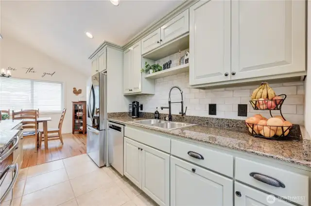 Granite counters and new refrigerator. All kitchen appliances stay.