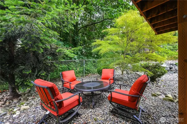 Tranquil setting with privacy and mature trees.