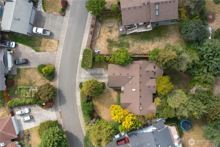 You can see that this home is surrounded by dry beautiful mature trees, shrubs and landscaping.