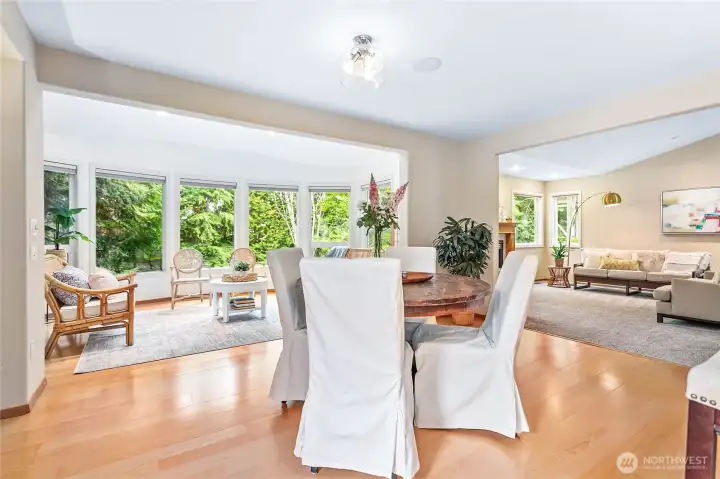 Open and inviting sunroom with views of your private parklike backyard.