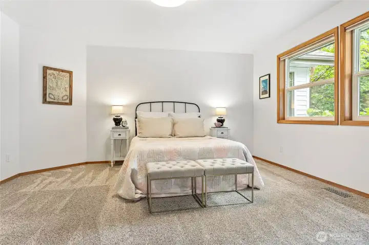 Plenty of space in this primary bedroom for queen and king sized beds.