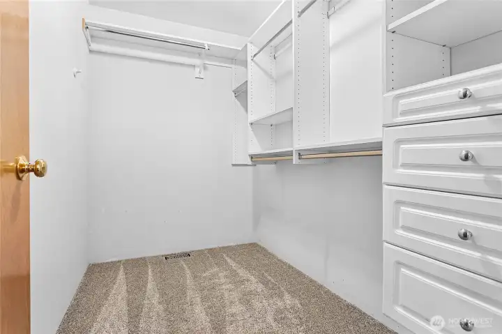 Spacious primary walk in closet.