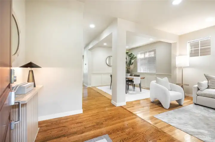 Inviting entry with gleaming hardwood floors.