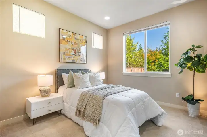 Sunlit main floor bedroom /office, or bonus room.