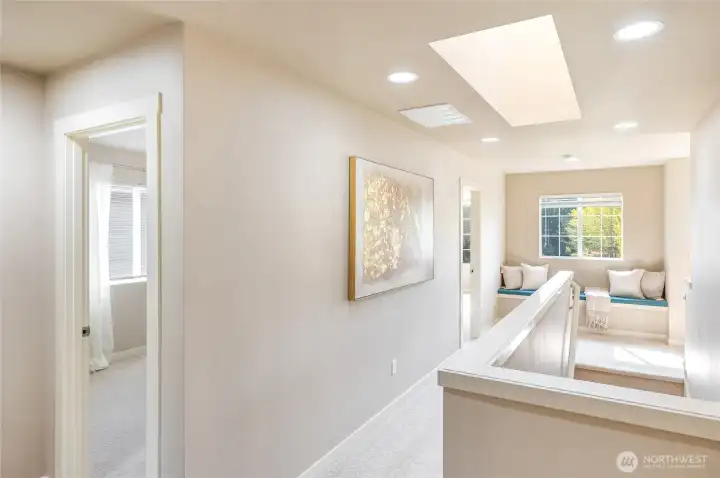 Upper landing with a skylight for added natural light.