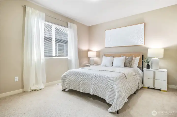 Sunlit additional bedroom.