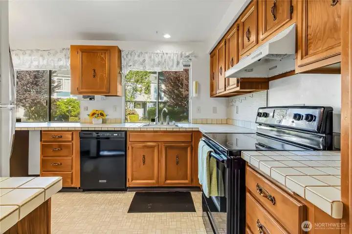 Kitchen has plenty of cabinets & counter space