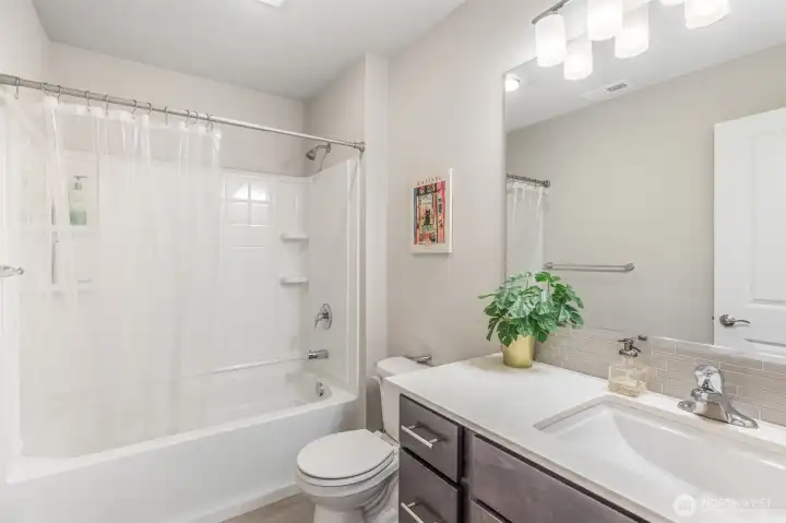 Upper floor guest bathroom.