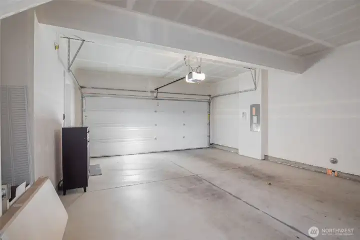 Deep two bay garage with storage space.