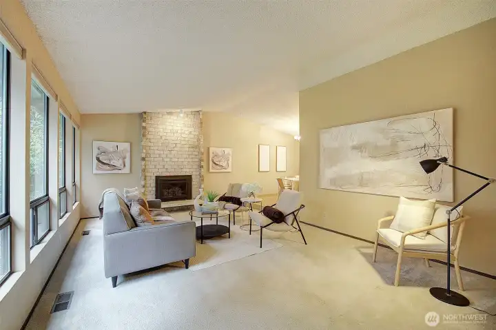 Living room with dining room entry on the right.