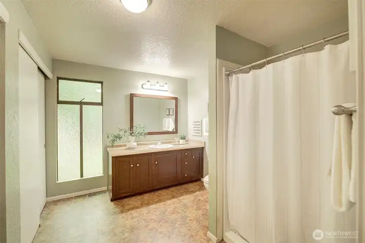 Extra large 3/4 bath off the primary with large closets.