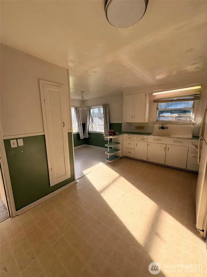 Off of the huge mudroom is a really large kitchen with original era charm still in tact.