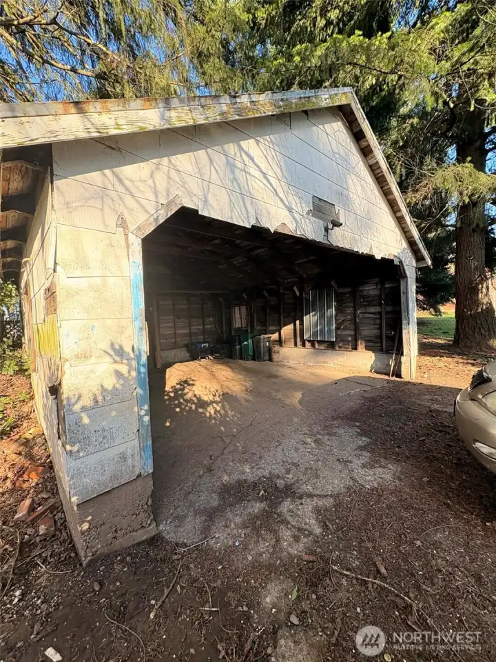 Rustic, yes, but it's still additional covered parking.  Or maybe you need a place to store your tools as you remodel the current home.