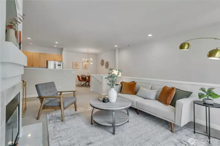 Open-concept living, kitchen, and dining areas create a seamless flow, ideal for both everyday living and entertaining.