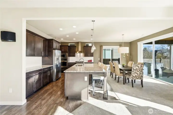 In the kitchen, experience the oversized island with room for even the most gear friendly chefs.