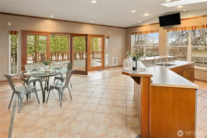 incredible enclosed sun room / BBQ and bar area