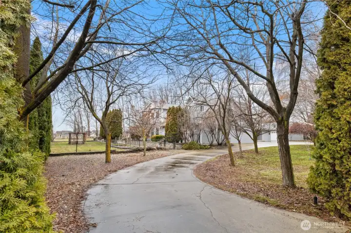 Tucked behind a lush, full hedge for ultimate privacy