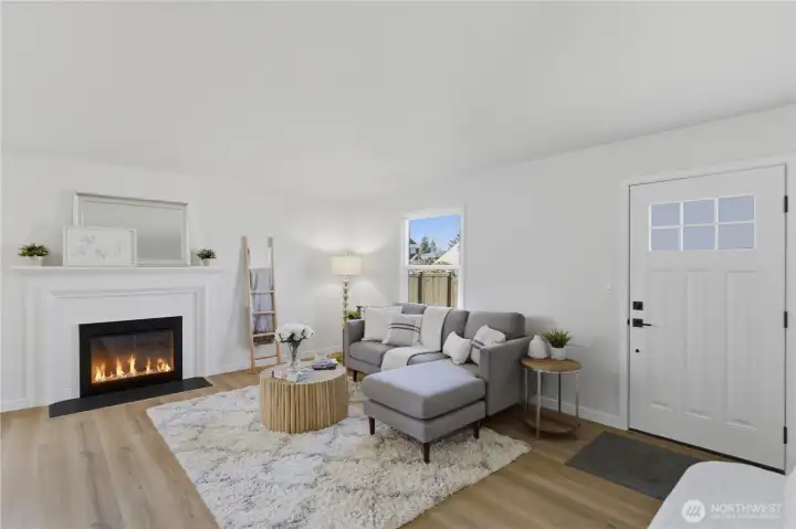 Bright living room with fireplace and natural light