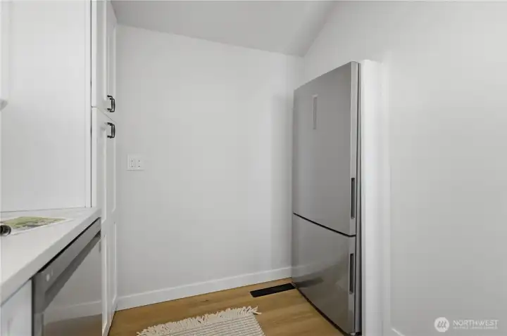 Dedicated kitchen area with efficient layout and storage