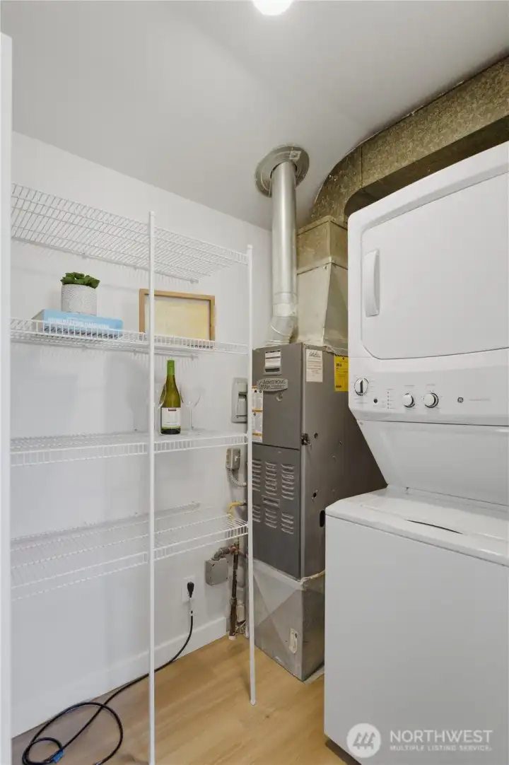 Laundry area with additional storage space