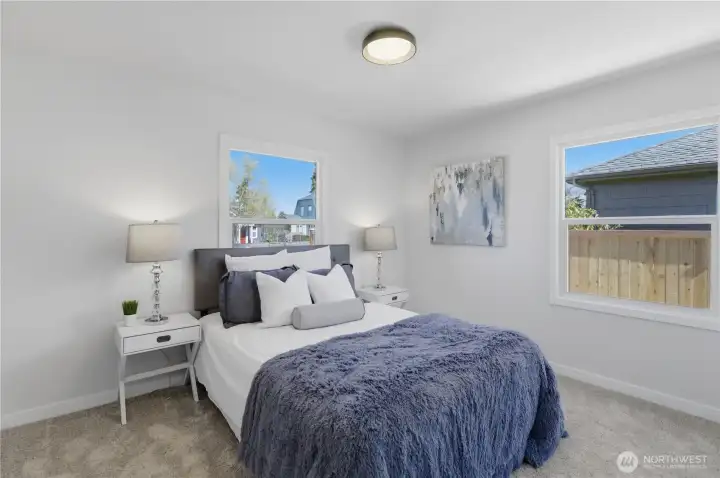 Primary bedroom with natural light and comfortable layout