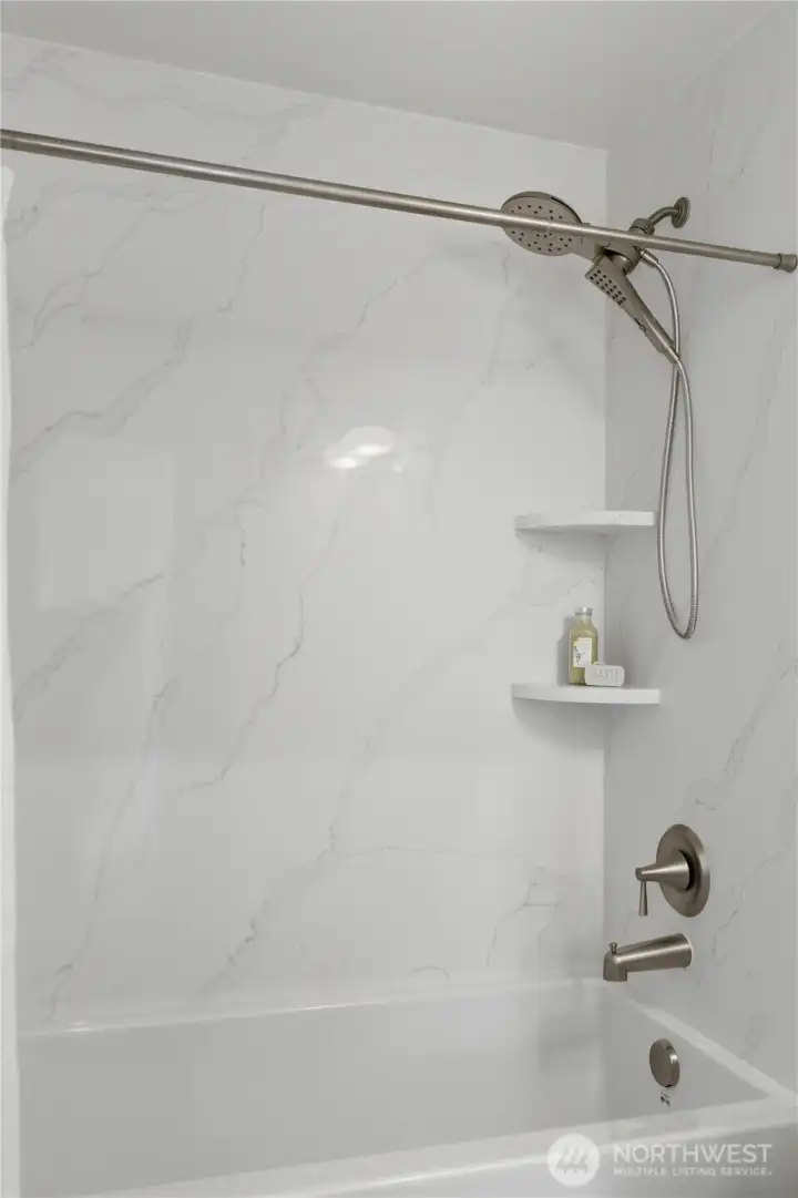 Max Tub/shower with quartz surround and clean finishes