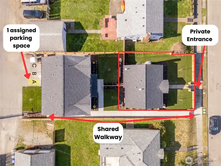 Aerial view highlighting full property layout and shared access
