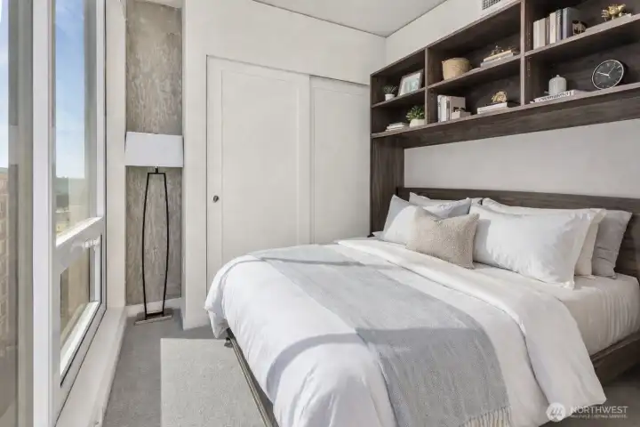 Integrated Murphy bed offers a flexible secondary bedroom