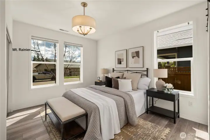 Guest suite offers a great view of Mt. Rainier, its own private bath, Engineered hardwoods and black out shades.  Plus a space saving closet door.