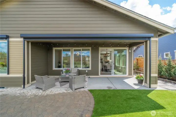 Seller paid to have extra topsoil brought in so that patio and back yard would be level and raised.