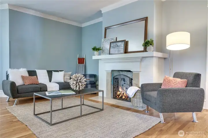 Oak hardwood floors extend throughout the main floor and subtle details like crown molding give elegance to each room.