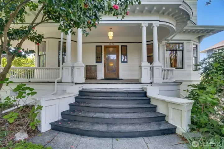 We've shared a few highlights, but now let's start from the front door and take a full tour. We begin on the wraparound covered porch.