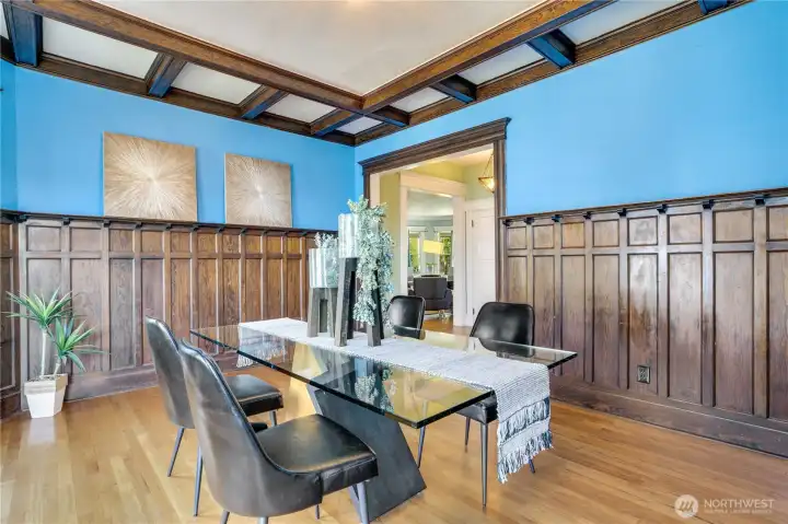 A cased opening leads from the hall into the spacious dining room with its original millwork and historic details intact.