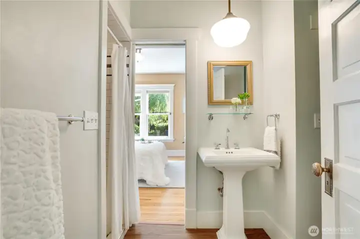 This 2nd 3/4 bath with its tiled shower stall opens directly into the bedroom.