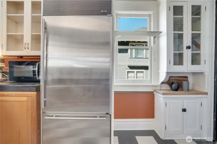 This SubZero fridge and a bit of additional counter and cabinet space in the corner nearest the dining room complete the kitchen.